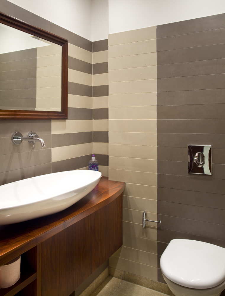 Powder Room off of Living Room and Dining Room 